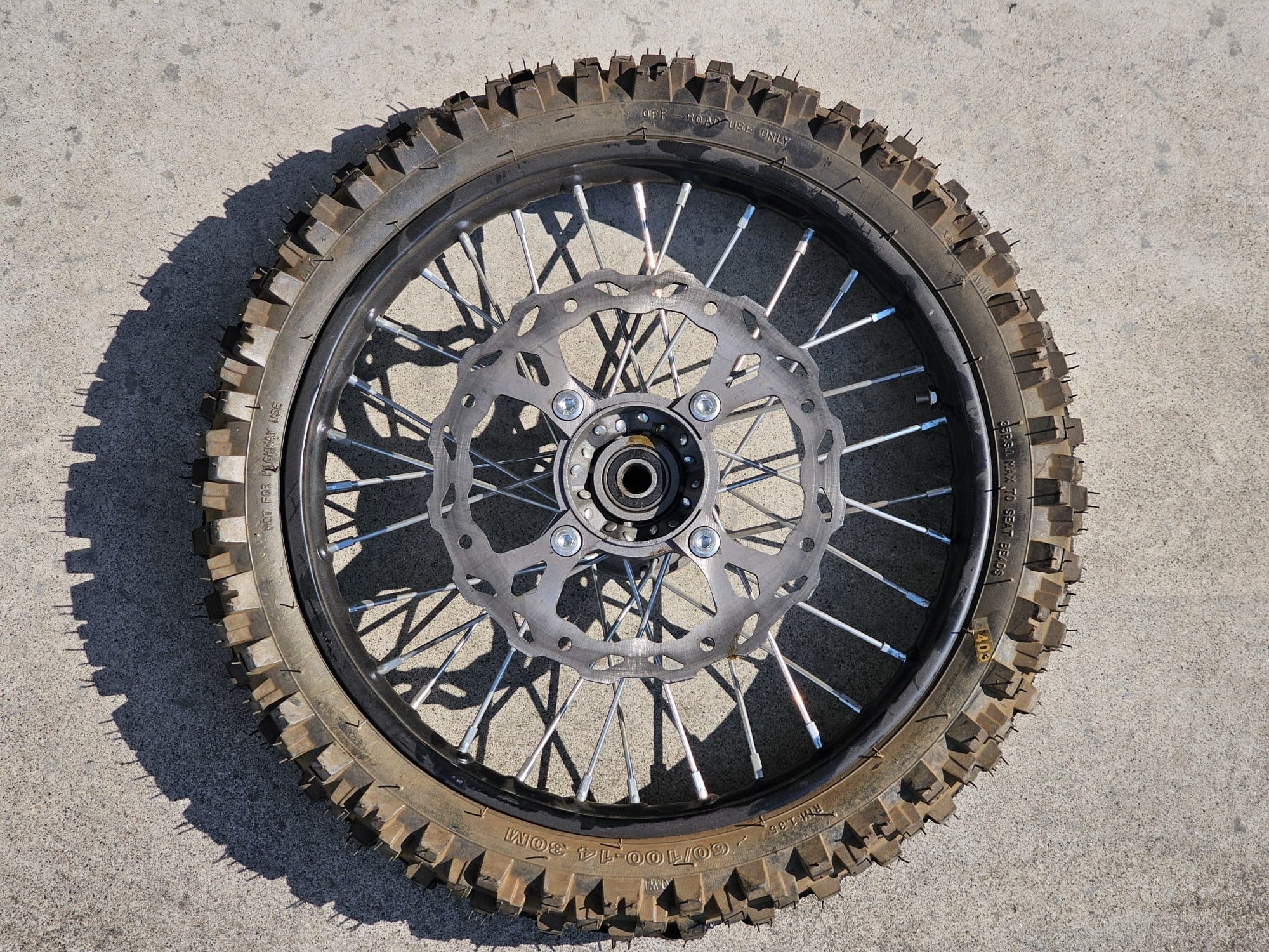 CERCHIO GOMMATO GOMMA CERCHIATA FERRO ANTERIORE 60/100-14 CON DISCO FRENO ATTACCO SDG PERNO RUOTA 15mm